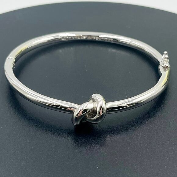 Kate Spade Sailor's Knot Love Knot Polished Silver Tone Hinged Bangle Bracelet - Picture 1 of 9